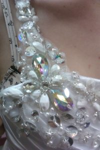 detail of shoulder beading