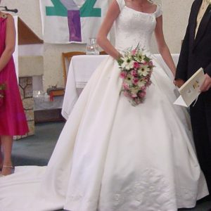 Size 8 -10, Cream coloured off shoulder lace up embroidered bodice, full skirt with 2 m train with embroidered edges