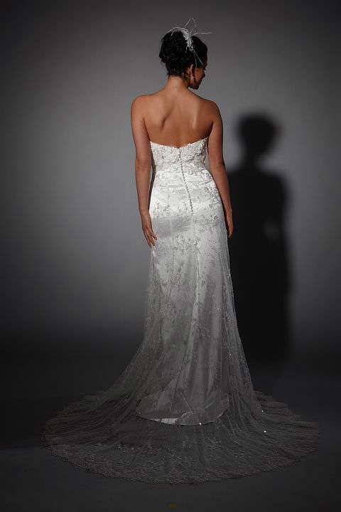 Delicate slim line lace gown with 3D petals across the bust & sheer lace train