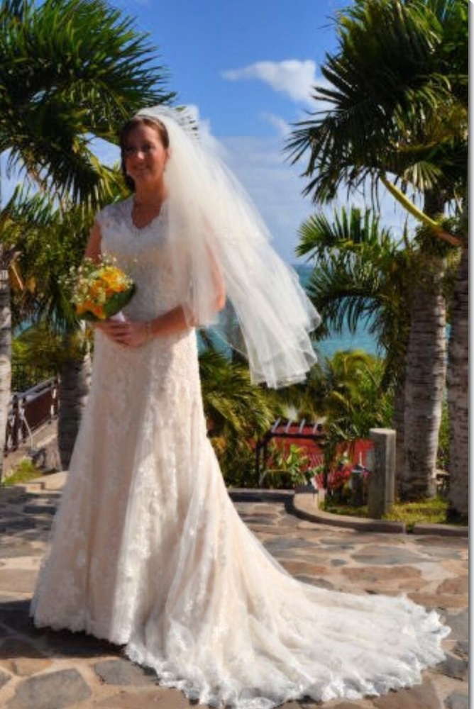 Ivory Lace gown with champagne silk underlay and key hole back