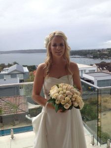 Dress with trail in wrist strap