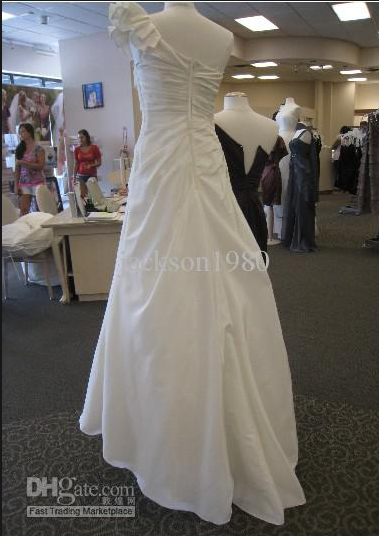 Figure flattering one shoulder A Line ivory gown bought in the US
