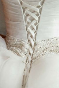 Detail - Crystal pearl belt, lace up back